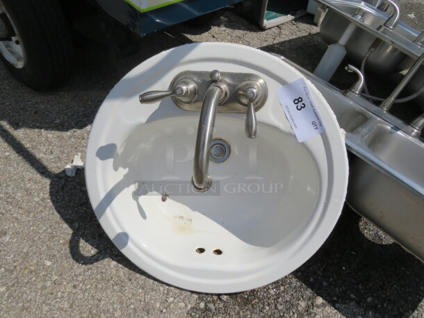 One 19 Inch Round Drop In Sink With Faucet. - Image 1 of 1