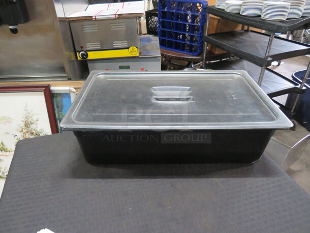 One Full Size 6 Inch Deep Black Food Storage Container With Lid. - Image 1 of 1