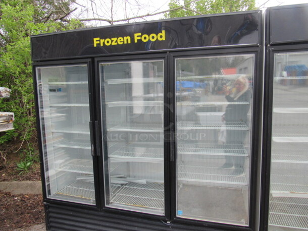 One 3 Door True Freezer With 16 Racks. 115/208-230 Volt. 1 Phase. Model# GDM-72FLD. Working When Removed.  - Image 2 of 3