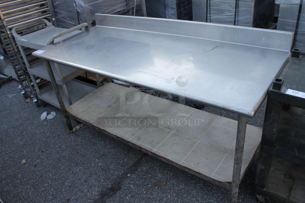 Stainless Steel Table w/ Back Splash and Under Shelf. - Image 1 of 4