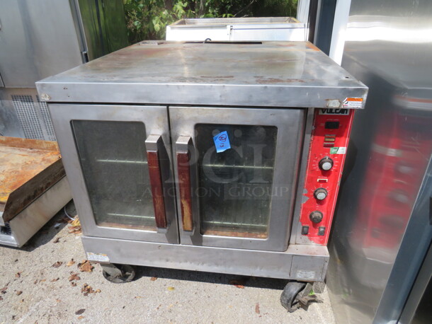 One Vulcan Natural Gas Convection Oven, With 2 Racks On Casters. 40X43X39