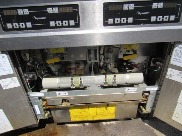 One Natural Gas Double Frymaster With Filtration On Casters. Model# FMJ250E. 31X32X46.5. $34,807.20. - Image 2 of 2