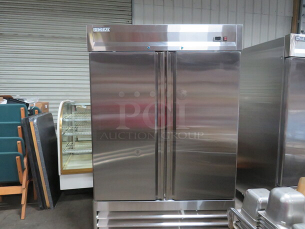 One Motak 2 Door freezer With 6 Racks, On Casters. Model#MSD-2DF-BAL-X. 52X32X83