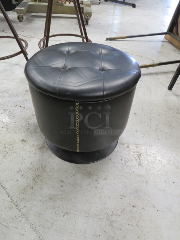 One Black Metal Swivel Stool/Ottoman With A Black Cushioned Seat. 17X15.5 - Image 1 of 2