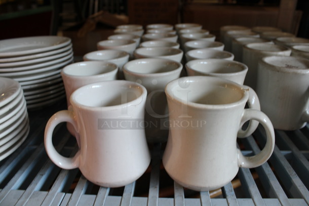 20 White Ceramic Mugs. 4x3x3.5. 20 Times Your Bid!