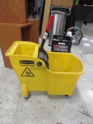One Mop Bucket And Wringer.