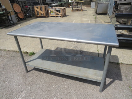 One Stainless Steel Table With Under Shelf. 60X30X33