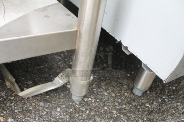 BRAND NEW SCRATCH AND DENT! Stainless Steel Commercial Table w/ 2 Under Shelves and Back Splash. - Image 4 of 4