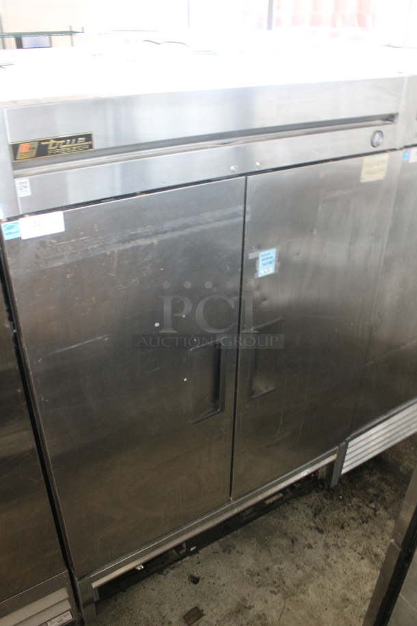 2013 True T-49F ENERGY STAR Stainless Steel Commercial 2 Door Reach In Freezer w/ Poly Coated Racks on Commercial Casters. 115 Volts, 1 Phase. Tested and Working! - Image 1 of 7