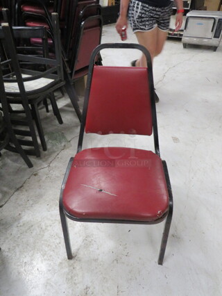 Black Metal Stack Chair With Cushioned Seat And Back. 6XBID