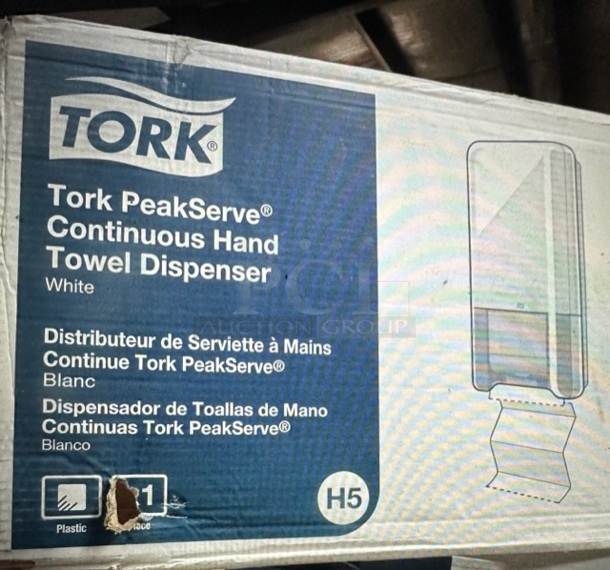 One NEW Tork Hand Towel Dispenser. #55 25 20. $68.75.