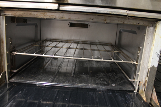 Garland X60-6G24RR Stainless Steel Commercial Natural Gas Powered 6 Burner Range w/ Flat Top Griddle, 2 Ovens, Over Shelf and Back Splash. - Image 4 of 9
