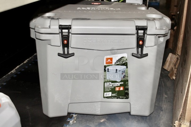 NEW/NEVER USED!! Ozark Trail 60-Quart High Performance Rolling Cooler With Wire Basket. 