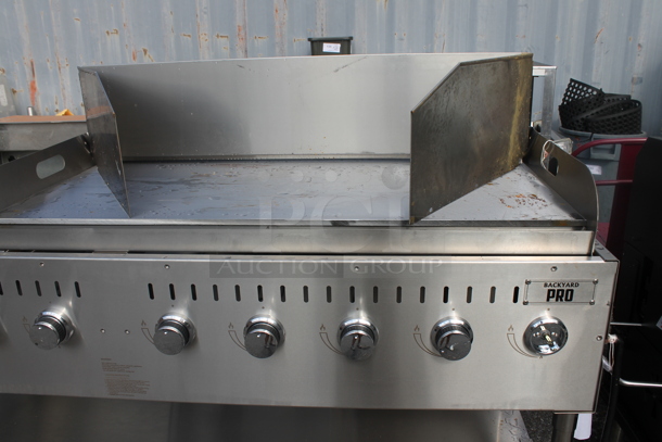 BRAND NEW SCRATCH AND DENT! 2022 Backyard Pro LPG72 Stainless Steel Commercial Propane Gas Powered Portable Catering Grill w/ Under Shelf on Commercial Casters.  - Image 3 of 5