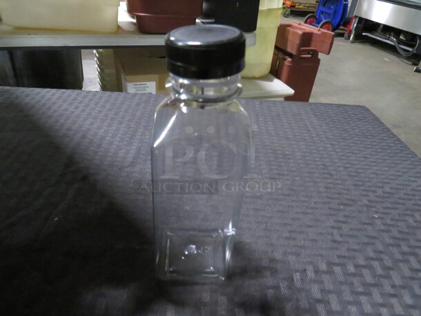 One Lot Of 7 NEW Poly Bottles With Lids.
