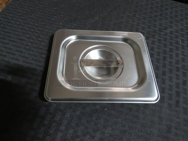 NEW Vollrath 1/6 Size Stainless Steel Lid. 3XBID - Image 1 of 1
