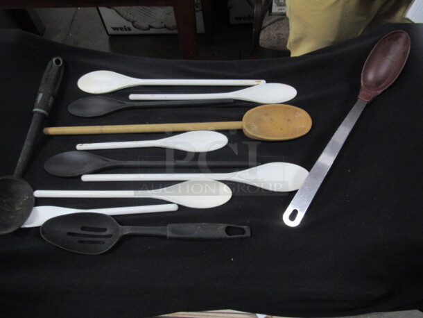 One Lot Of Assorted Poly Spoons.