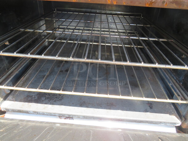 One Vulcan Natural Gas 6 Burner Range With 2 Racks, And  Stainless Steel Over Shelf. 36X40X71 - Image 2 of 2