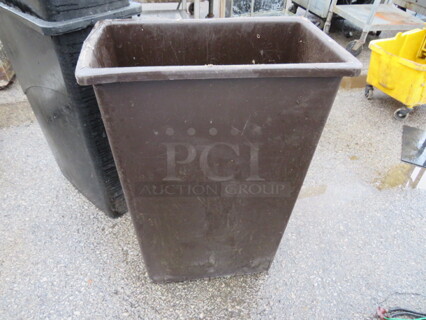 One Brown Slim Jim Trash Can.