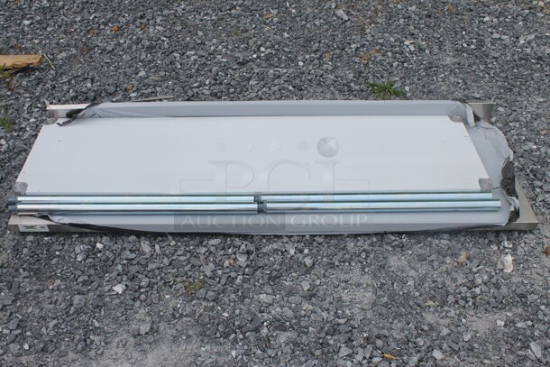 BRAND NEW SCRATCH AND DENT! Regency 600TB2472G Commercial Stainless Steel Disassembled Work Table With Backsplash, Undershelf And Galvanized Legs - Image 1 of 4