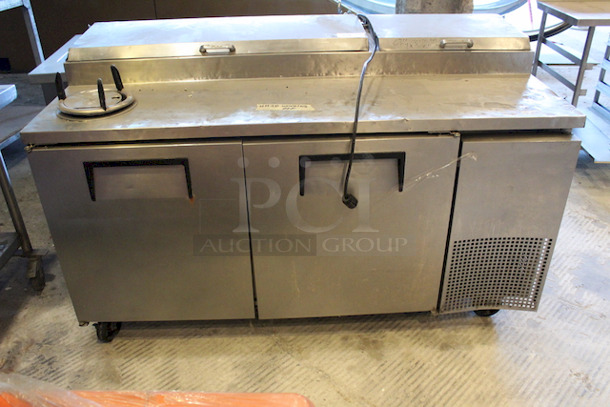 OUTSTANDING!! True TPP-67 67" Pizza Prep Table w/ Refrigerated Base, 115v, On Commercial Casters. 
Tested. Turned On. Got Cold.
67-1/4x32-1/2x42  115 V, 60 Hz, 1 ph - Image 2 of 5