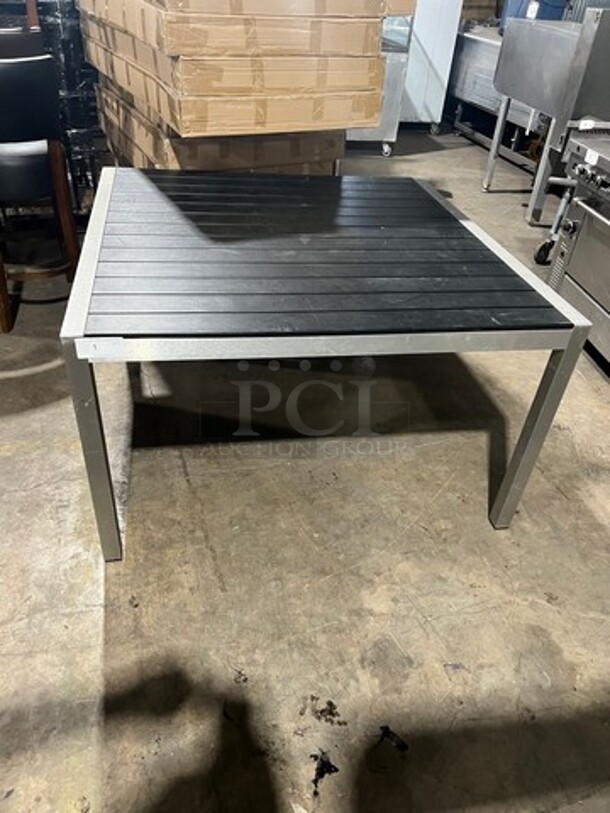 BRAND NEW! OUT OF THE BOX! STC Black Teak Slats 51" By 51" Dining Table! Brushed Alluminum Welded Frame! Suitable For Indoor & Outdor Use!  - Image 1 of 6