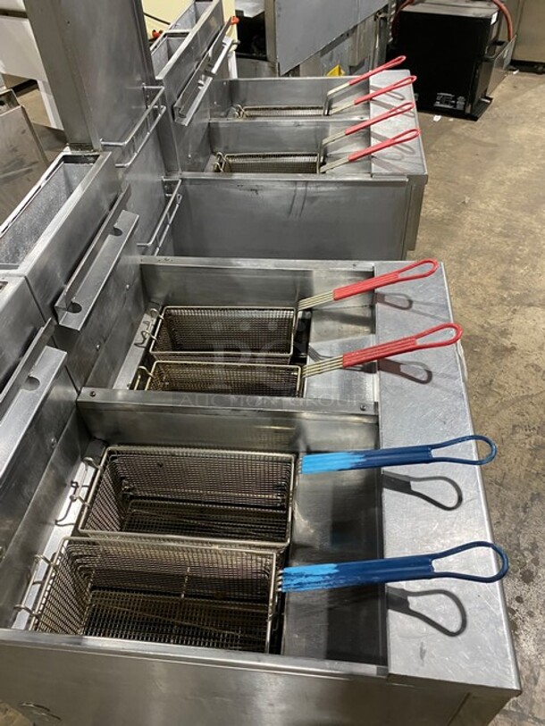 GREAT! Pitco Frialator 4 Bay Natural Gas Powered Commercial Deep Fat Fryer! With Middle Dump Station! With 8 Frying Baskets! With Oil Filter System! All Stainless Steel! MODEL: SGH50 SN: G11BD005229! 115V! On Casters! Working When Removed!  - Image 5 of 12