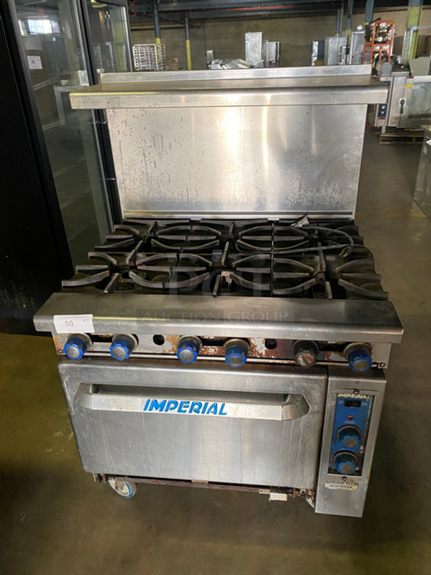 NICE! Imperial Commercial 6 Burner Natural Gas Powered Stove! With Full Size Oven Underneath! With Metal Oven Racks! With Backsplash & Overhead Salamander Shelf! All Stainless Steel! On Casters!