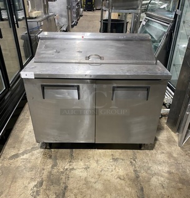 True Commercial Refrigerated Sandwich Prep Table! With 2 Door Underneath Storage Space! Poly Coated Racks! All Stainless Steel! On Casters! Model: TSSU4812 SN: 7399392 115V 60HZ 1 Phase