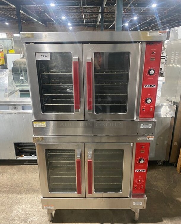 2 Vulcan VC4ED Stainless Steel Commercial Electric Powered Full Size Convection Ovens w/ View Through Doors! Metal Oven Racks and Thermostatic Controls! MODEL VC4ED SN:541041048 3/1 PH  208 Volts 2X Your Bid! Makes One Unit!  - Image 1 of 11