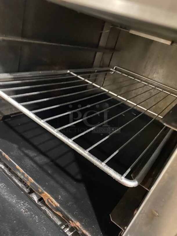 Nice! LATE MODEL! Sierra Commercial Natural Gas Powered 4 Burner Stove! With Raised Back Splash And Salamander Shelf! With Oven Underneath! All Stainless Steel! On Legs! - Image 8 of 11