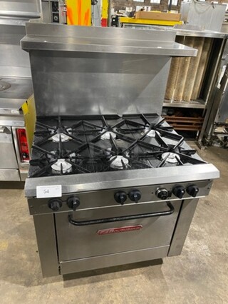 Southbend Commercial Natural Gas Powered 6 Burner Stove! With Raised Back Splash And Salamander Shelf! With Oven Underneath! All Stainless Steel! On Legs!