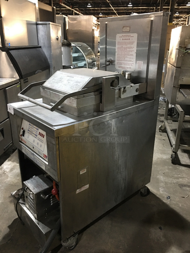 GREAT! Henny Penny Electric Powered KFC EDITION Pressure Fryer! With Oil Filter System! With Auto Lift Tray Holder! All Stainless Steel! On Commercial Casters! - Image 2 of 9
