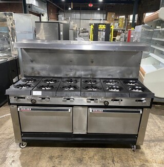 Garland Commercial Natural Gas Powered 12 Burner Stove! With 2 Full-Sized Ovens! With Metal Oven Racks! With Raised Back Splash & Salamander Shelf! Stainless Steel! On Casters!