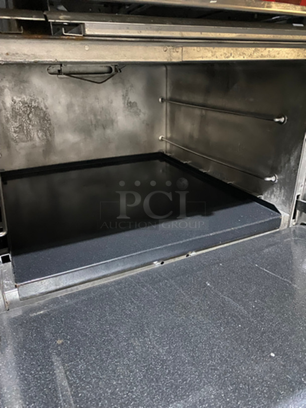MUST HAVE! Southbend Commercial Natural Gas Powered 10 Burner Stove! With 2 Full Size Ovens Underneath! With Backsplash & Overhead Salamander Shelf! All Stainless Steel! On Casters! - Image 7 of 8