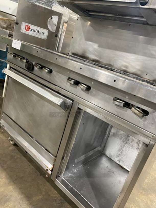 Garland Commercial Gas Powered 8 Burner Stove! With Raised Back Splash And Salamander! With Oven Underneath! All Stainless Steel! On Casters! - Image 9 of 11