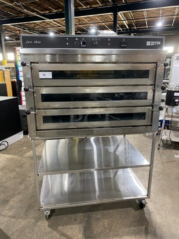 WOW! 2012 Doyon Commercial Natural Gas Powered Tripple Deck Pizza/ Baking Oven! With Shelf Storage Underneath! All Stainless Steel! On Casters! Model: PIZ6G SN: 282200000112