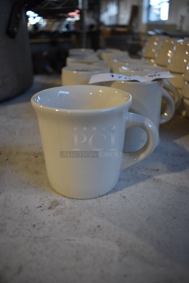 11 White Ceramic Mugs. 4x3x3.5. 11 Times Your Bid!