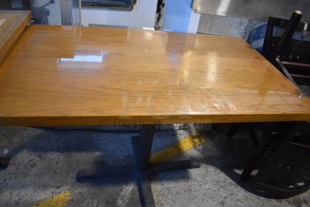 2 Wood Pattern Tables on Black Metal Table Base. 46x28x29.5. 2 Times Your Bid!