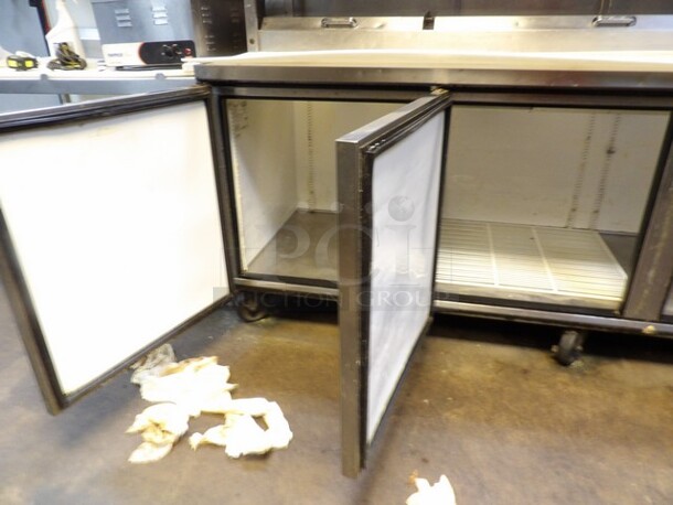 True 3-Door Stainless Pizza/Sandwich Prep Table W/Overhead Shelf. 
TESTED AND WORKING
Model TPP-93
Single Phase - Image 6 of 7