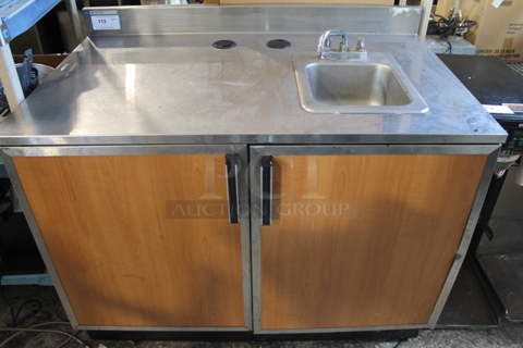 Duke Stainless Steel Commercial Counter w/ Sink Basin, Faucet, Handle, Back Splash and 2 Wood Pattern Doors.