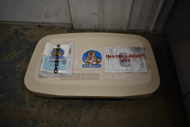BRAND NEW IN BOX! Koala Kare KB200-00 Gray Poly Wall Mount Diaper Changing Station. - Image 1 of 7