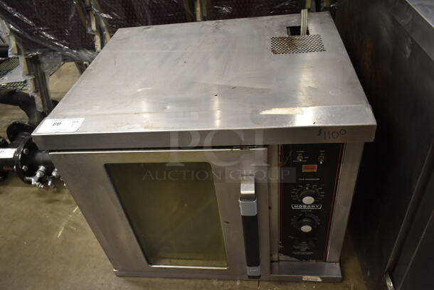 Hobart Stainless Steel Commercial Electric Powered Half Size Convection Oven w/ View Through Door and Thermostatic Controls. 240 Volts, 1 Phase.