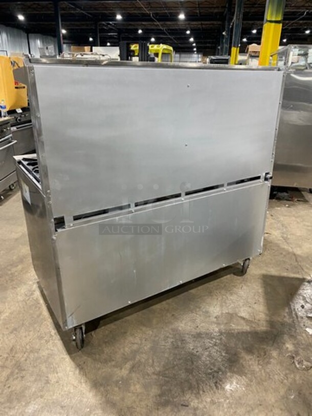 Commercial Natural Gas Powered 10 Burner Stove! With Raised Back Splash And Salamander Shelf! With 2  Oven Underneath! All Stainless Steel! On Casters! - Image 3 of 9