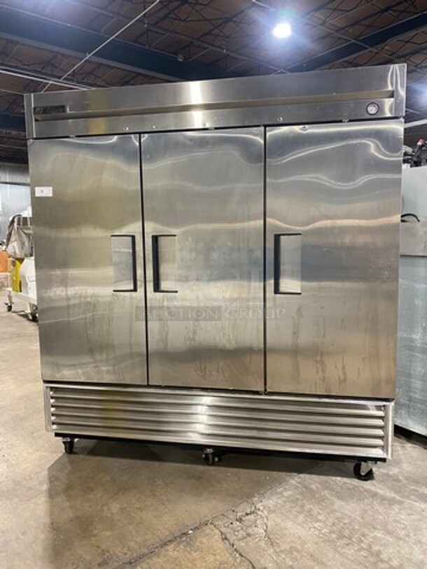 True Commercial 3 Door Reach In Freezer! With Poly Coated Racks! All Stainless Steel! On Casters! Model: T72F SN: 3245204 115/208/230V 60HZ 1 Phase