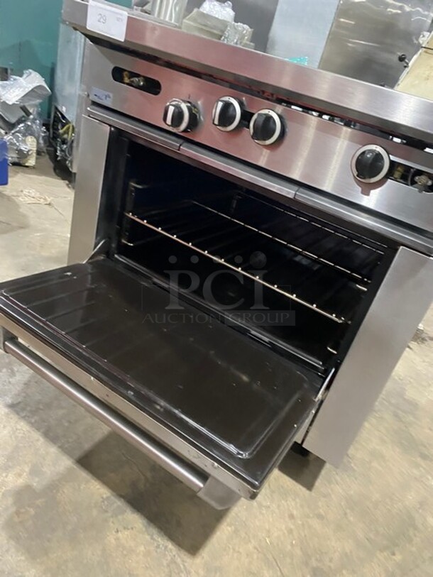 Garland Commercial Natural Gas Powered 4 Burner Stove With Hot Plate! with Oven Underneath! All Stainless Steel! On Casters! - Image 8 of 11