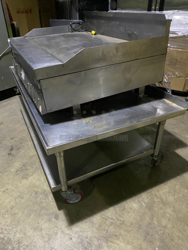 MUST HAVE! Garland Commercial Countertop Natural Gas Powered Heavy Duty Plancha Flat Grill! With Back And Side Splashes! On Heavy-Duty Stainless-Steel Equipment Stand! With Underneath Storage Space! On Casters! - Image 2 of 9