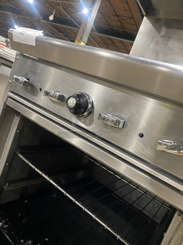 Commercial Natural Gas Powered 4 Burner Stove! With Raised Back Splash! With Oven Underneath! Stainless Steel Body! On Casters! - Image 9 of 10