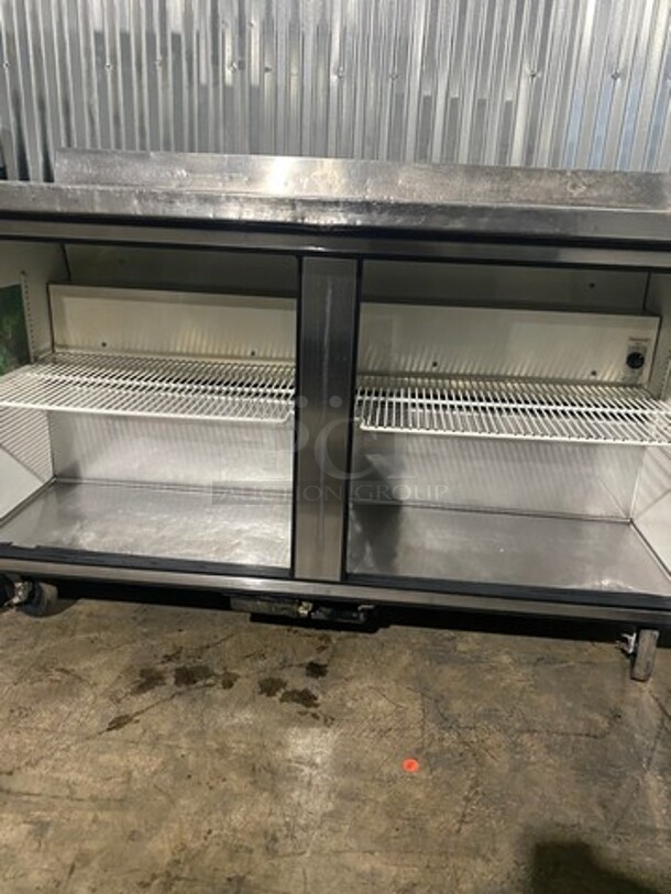 True Commercial 2 Door Work/Prep Top Lowboy Cooler! With Backsplash! All Stainless Steel! With Poly Coated Racks! On Casters! Model: TWT60 SN: 12972936! 115V 60HZ 1 Phase!
 - Image 5 of 8