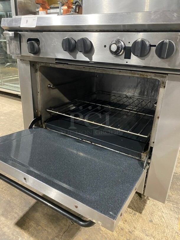 SouthBend Commercial Natural Gas Powered Split Top 4 Burner Stove! With Left Side Flat Griddle! With Full Sized Oven Underneath! With Backsplash! All Stainless Steel! With Metal Oven Racks! On Casters! Model: X336D-1GL SN: 04C65469! - Image 8 of 12